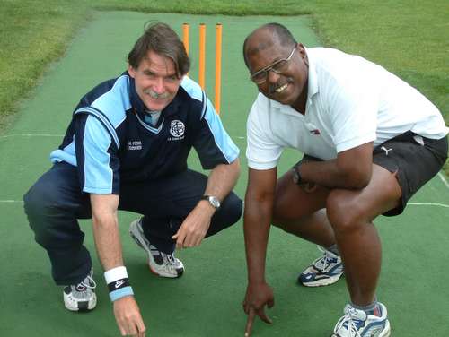 Stan Mortensen and Siva Nadarajah declare the pitch fit to play